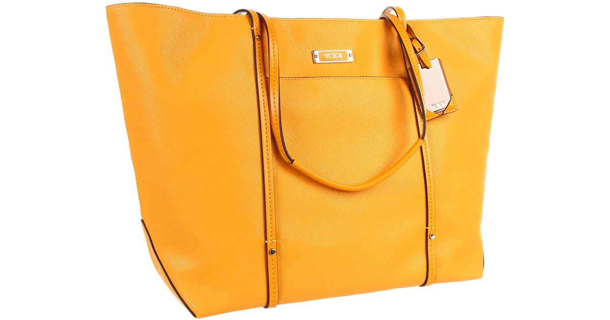 tumi yellow luggage