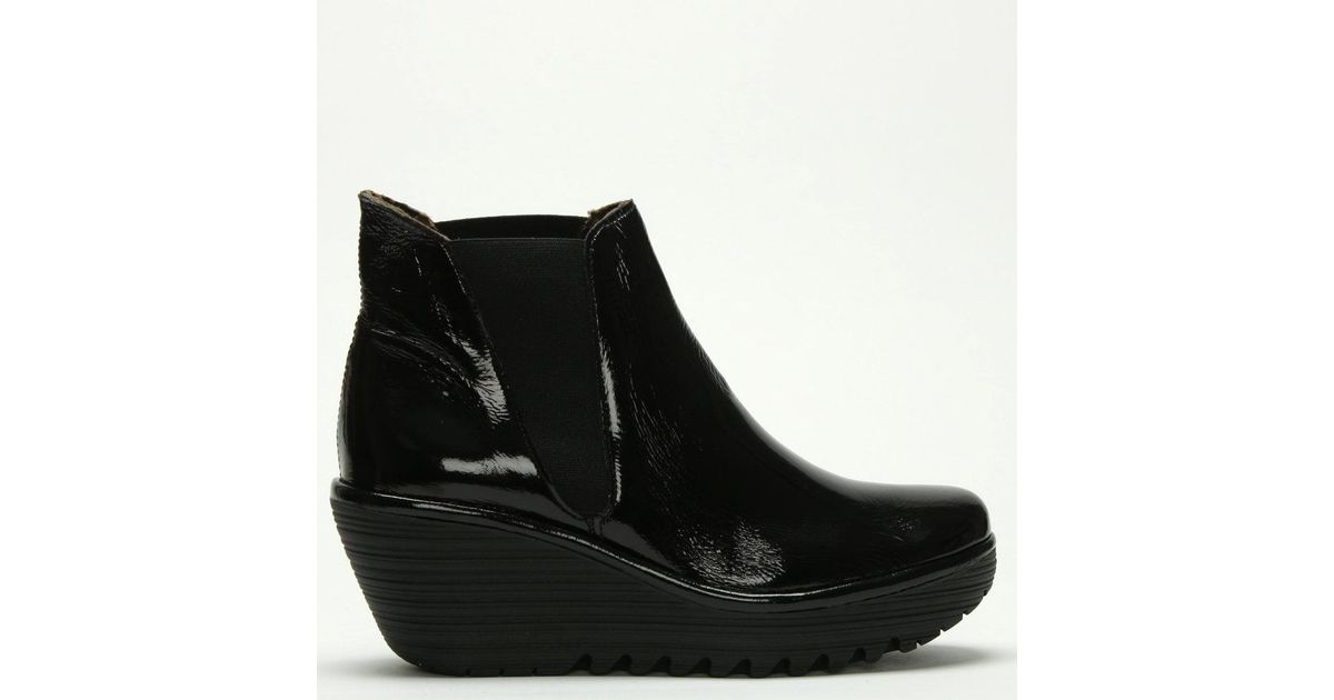 Fly London Woss Black Patent Leather Wedge Ankle Boot | Lyst
