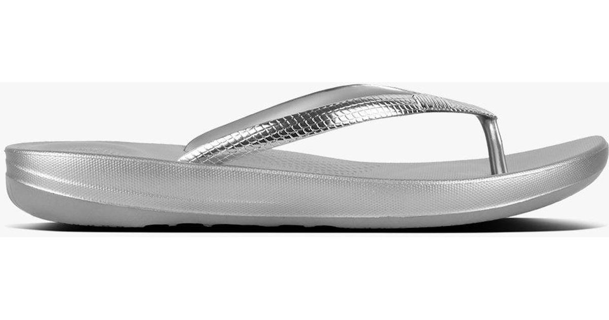 silver flip flops