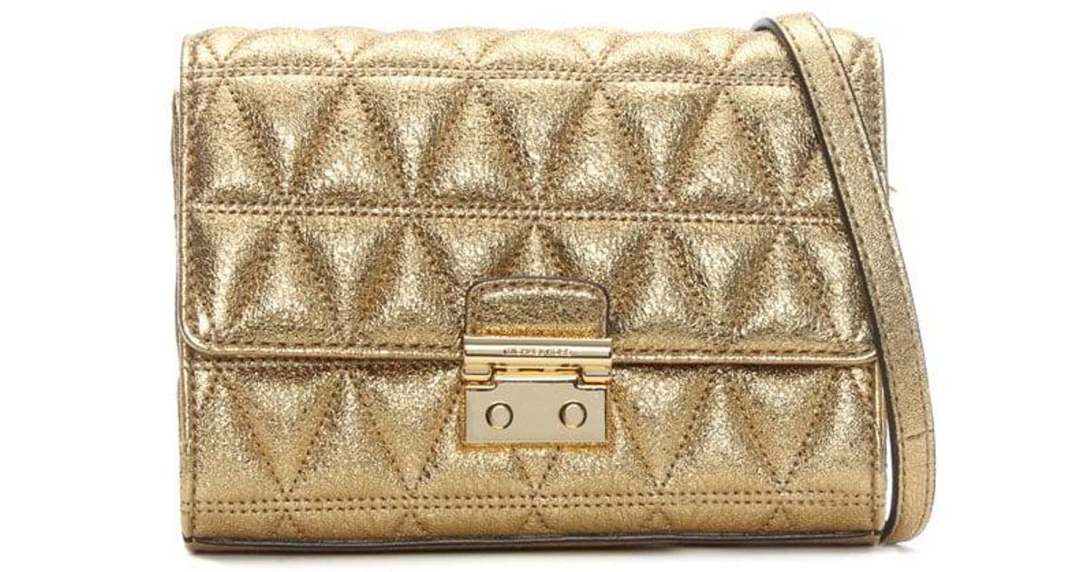 mk gold clutch bag