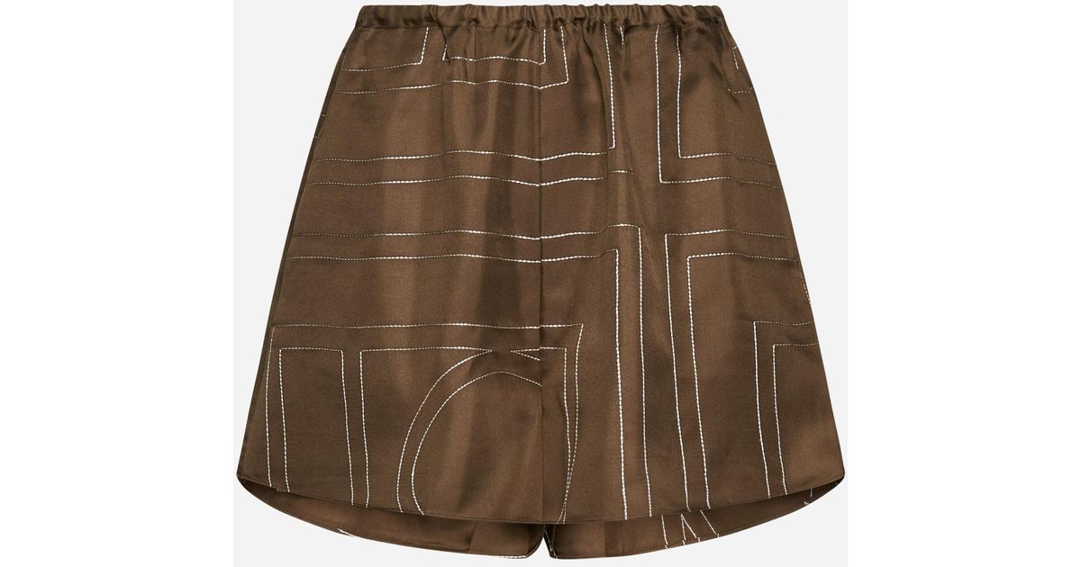 Totême Monogram Silk Shorts in Natural