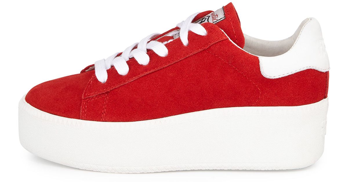 red and white platform sneakers