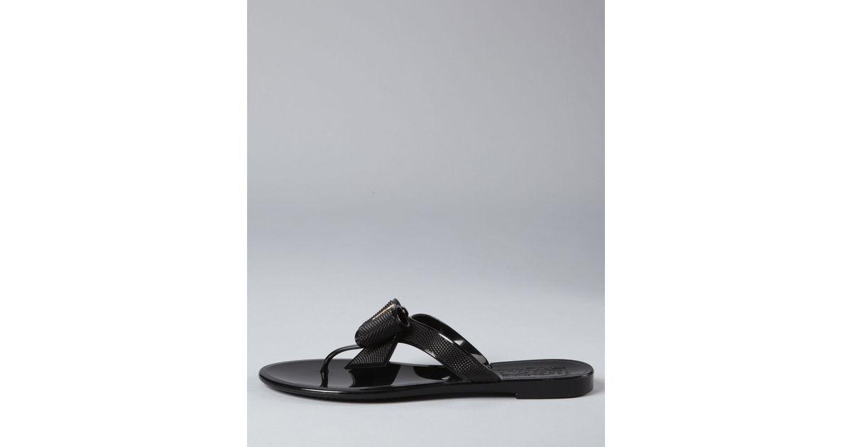 black ferragamo flip flops