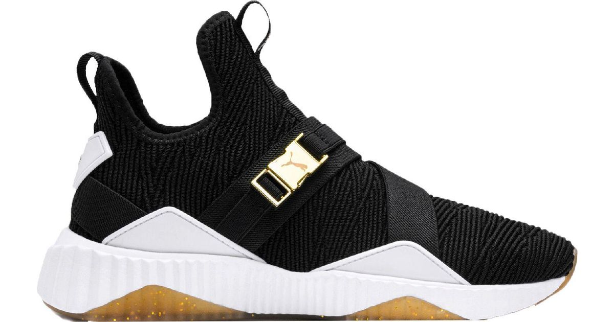 puma defy varsity mid black & gold shoes