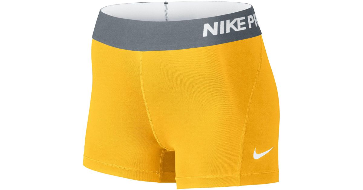 yellow nike compression pants