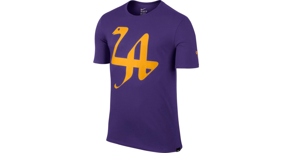 purple and gold nike shirt