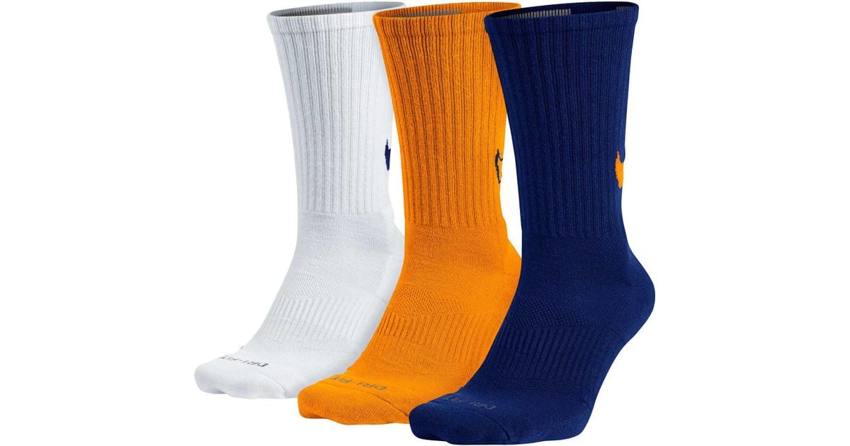 white and orange nike socks