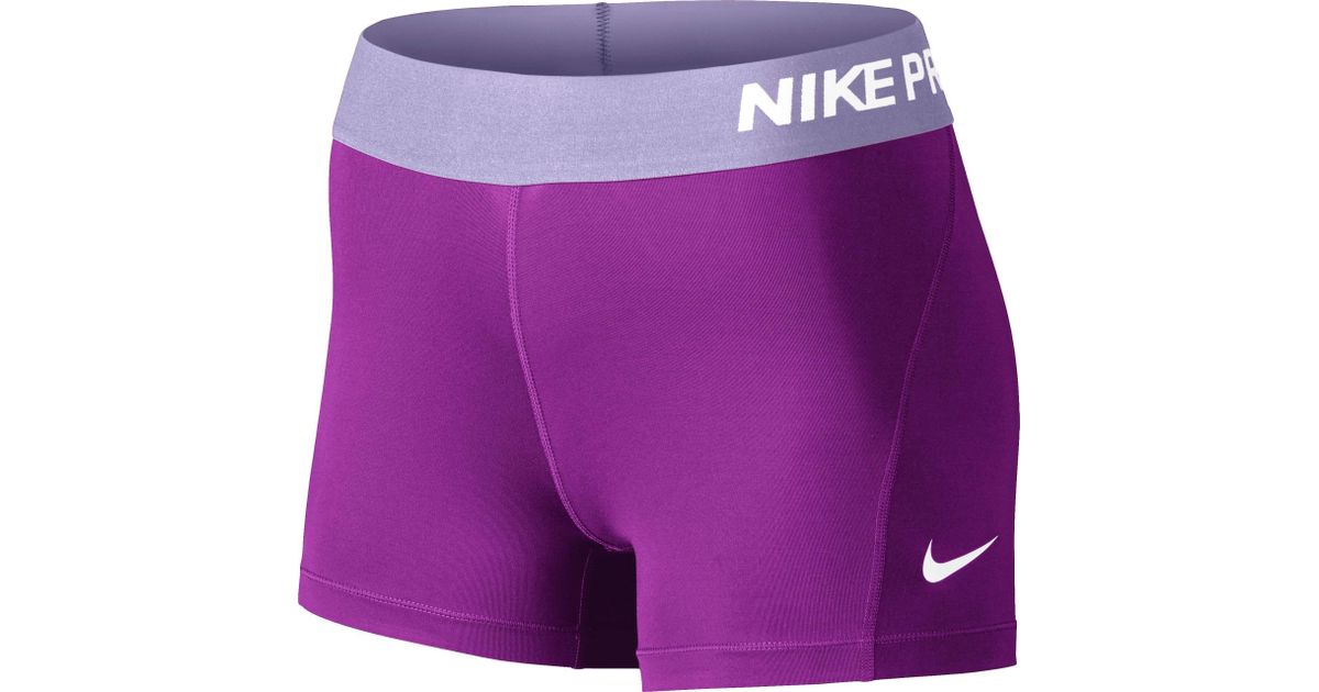 purple nike compression shorts
