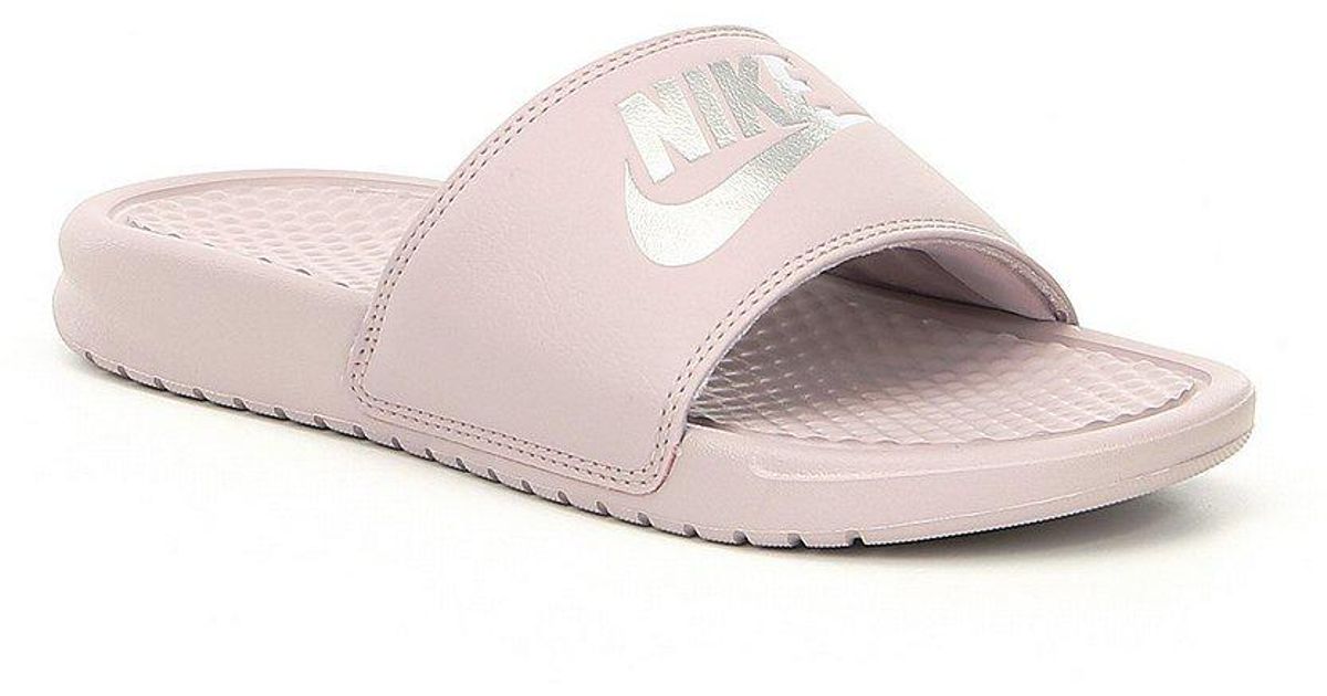 pink and gold nike slides