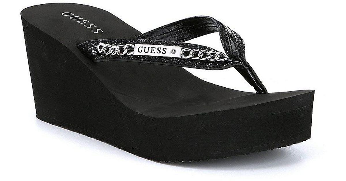 guess black wedge flip flops