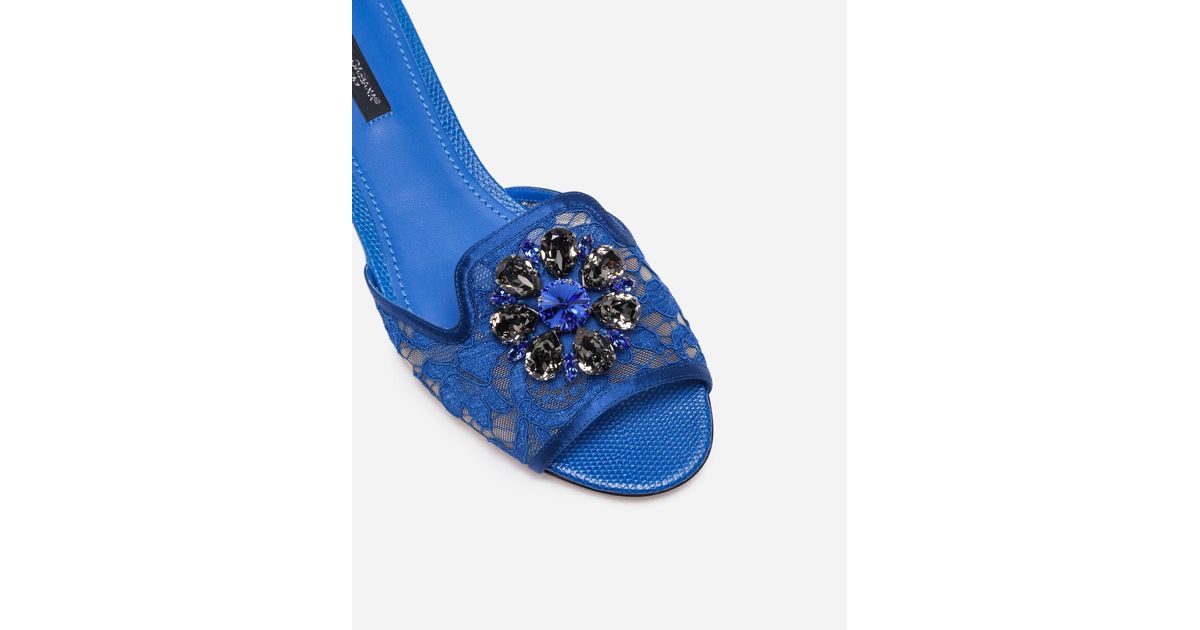 in blue slippers