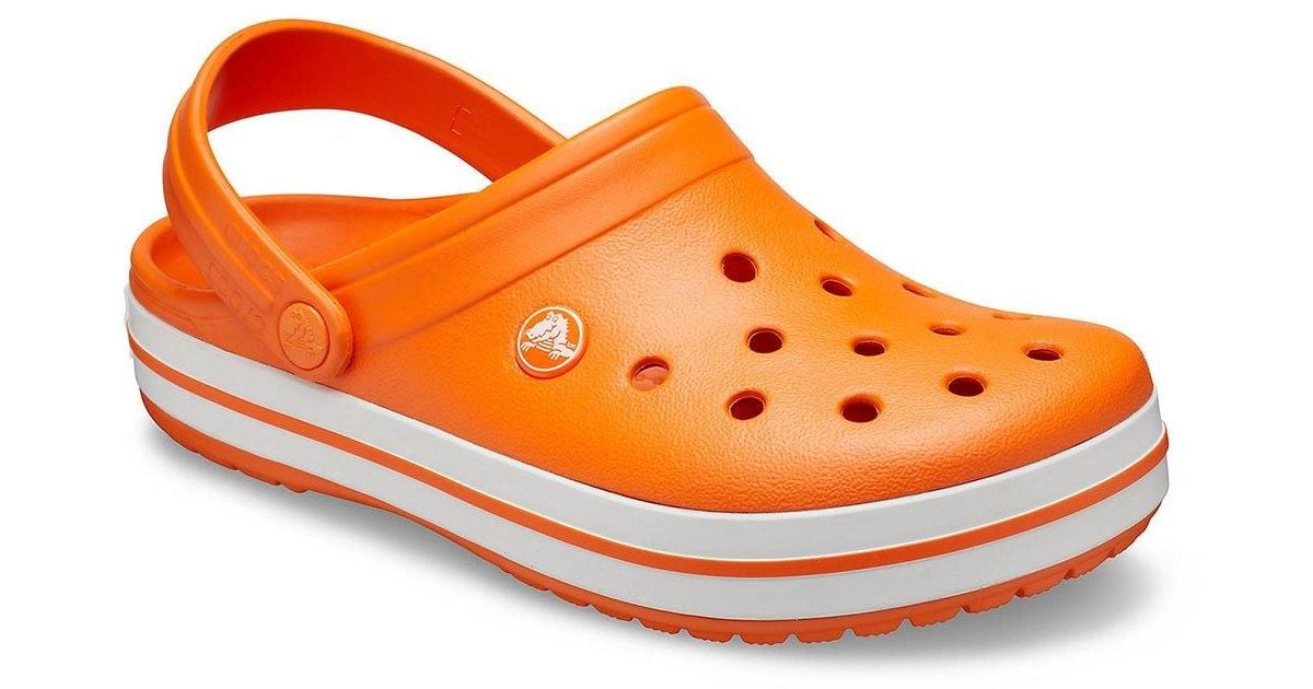 grey crocs with orange strap