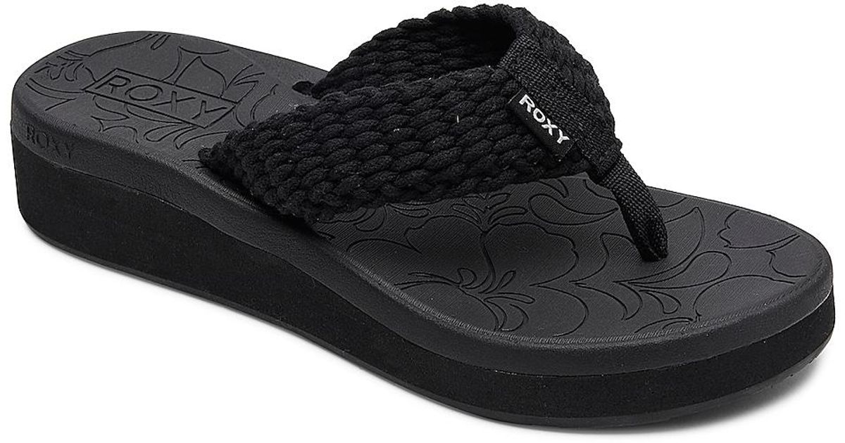 Roxy Synthetic Caila Wedge Flip Flop in Black - Lyst