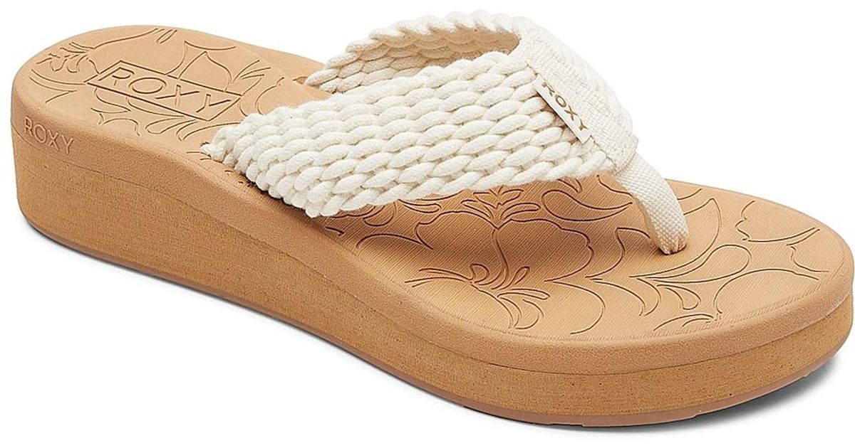 Roxy Synthetic Caila Wedge Flip Flop in Cream (Natural) | Lyst