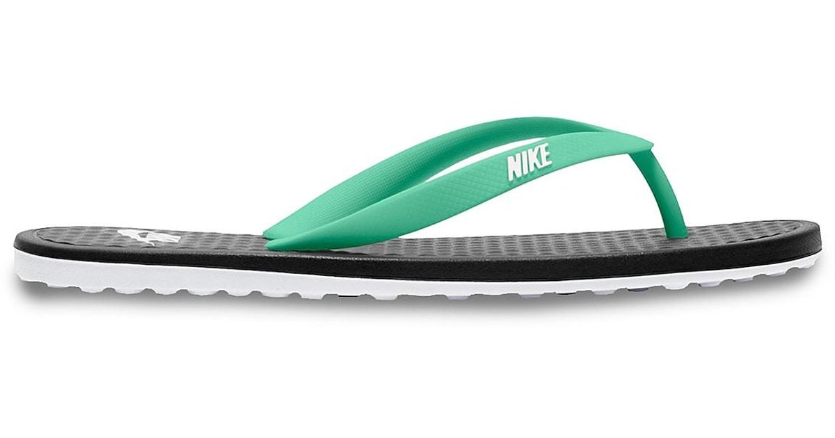 nike green flip flops