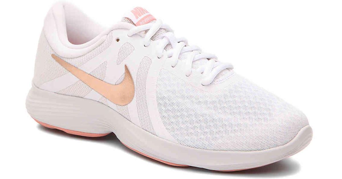 nike revolution rose gold