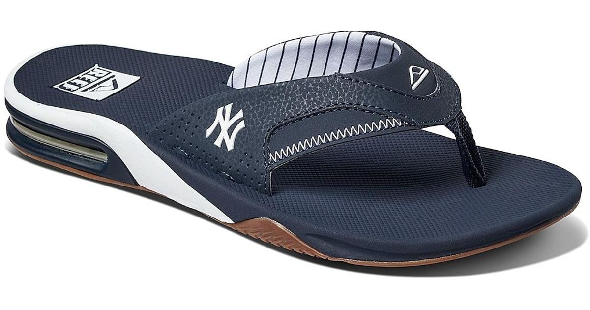 reef navy flip flops