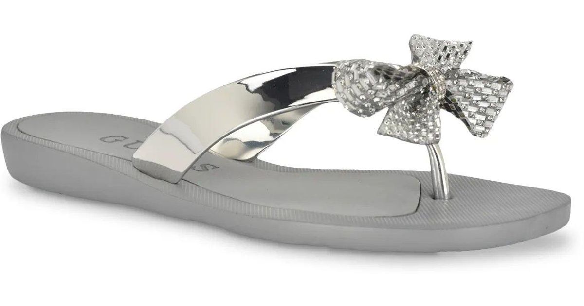 【GUESS】Tata Sparkle Botai Flipflop Sandals GUESS Women's Tata EVA Sparkle Bow Flip Flop Sandals - Macy's