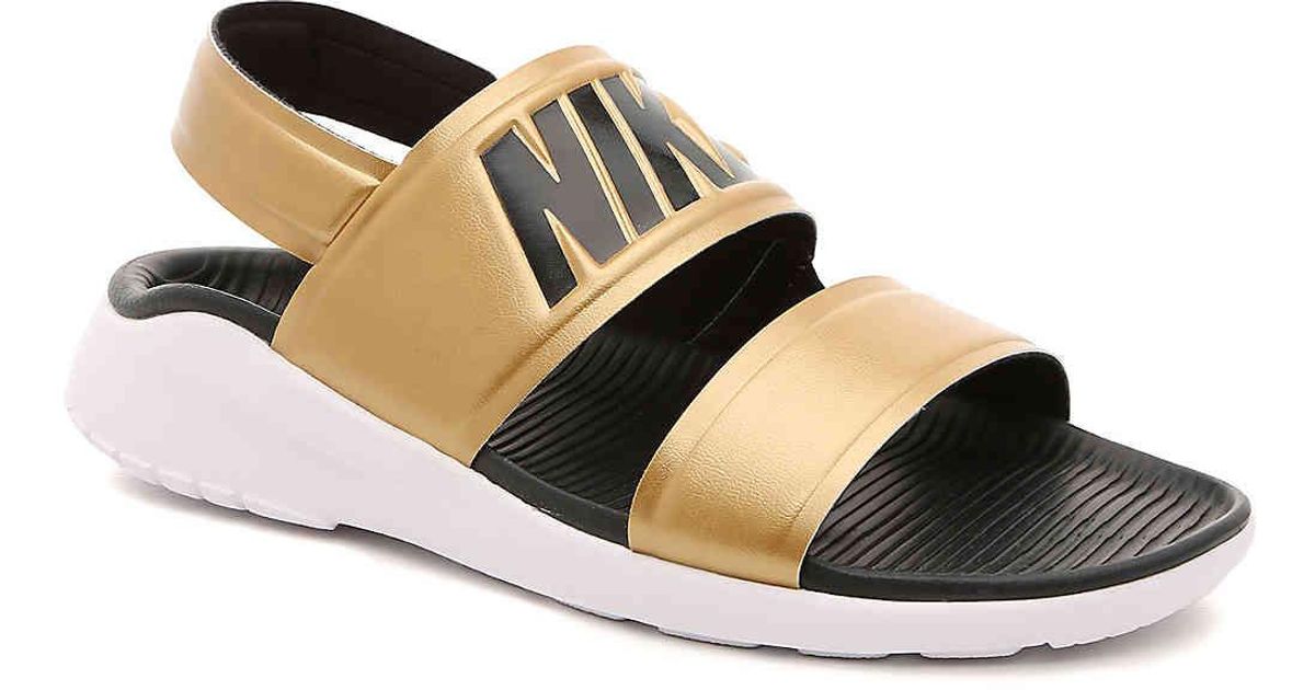 gold nike tanjun sandals