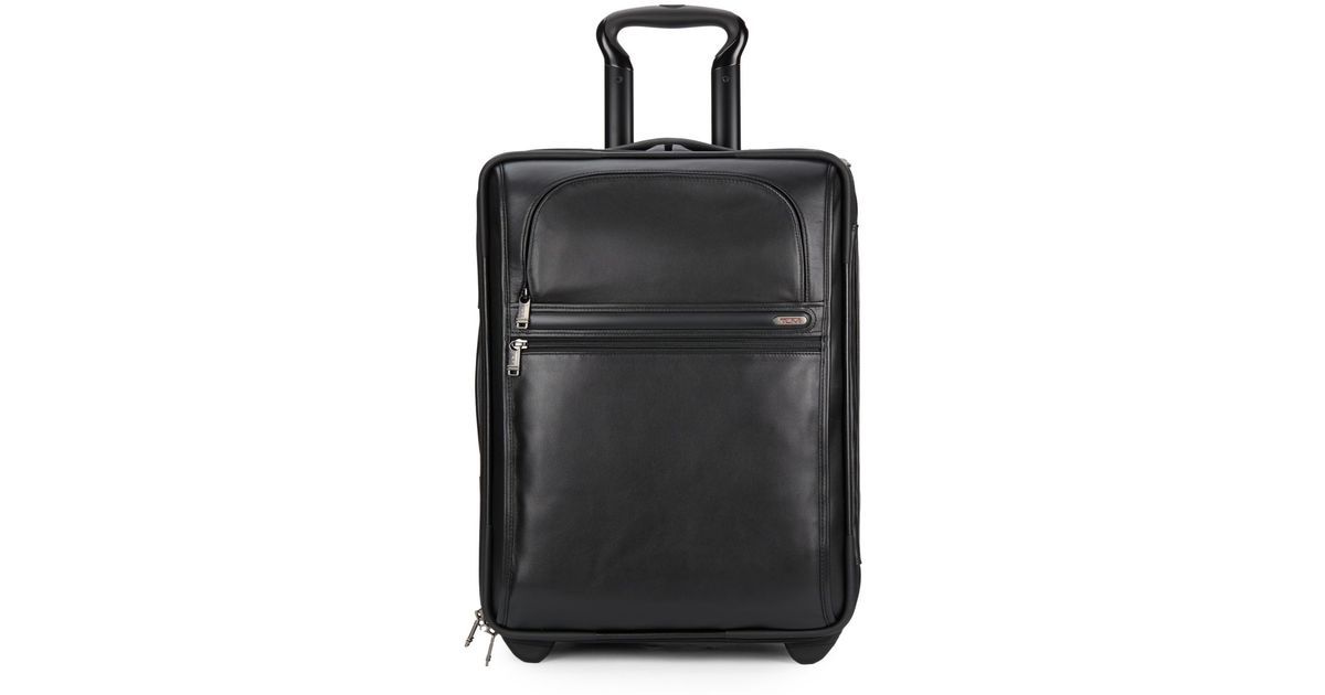 tumi leather carry on luggage