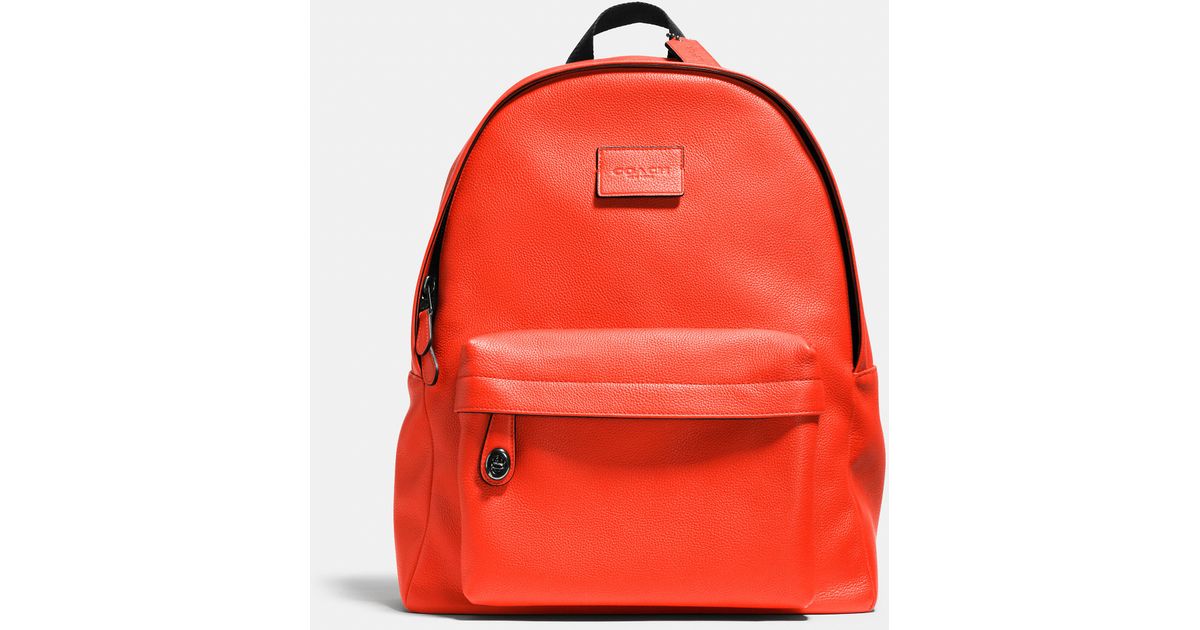 orange leather backpack