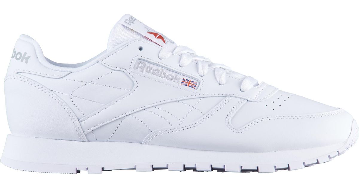 plain white reebok shoes