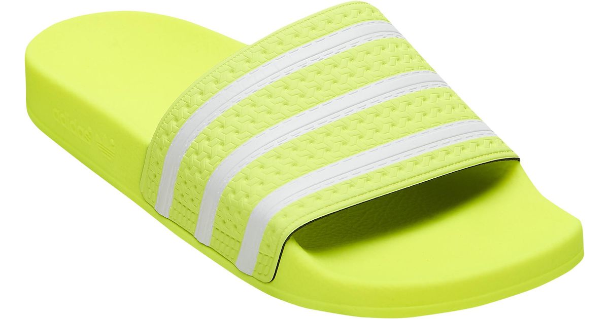 solar yellow adidas slides