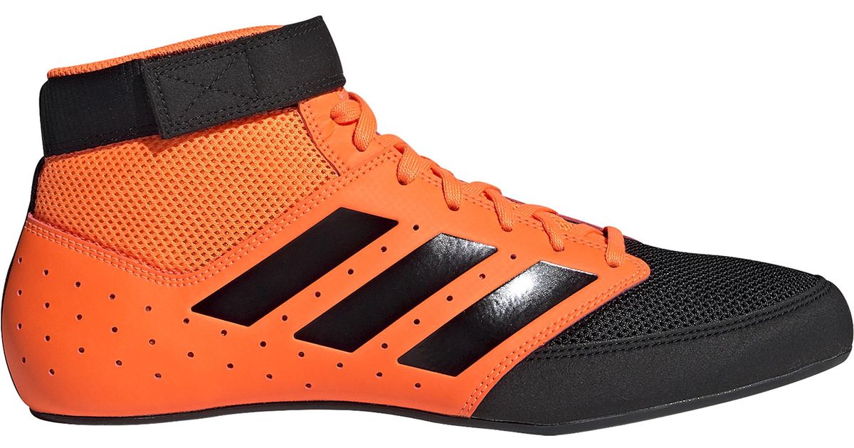 orange sole shoes