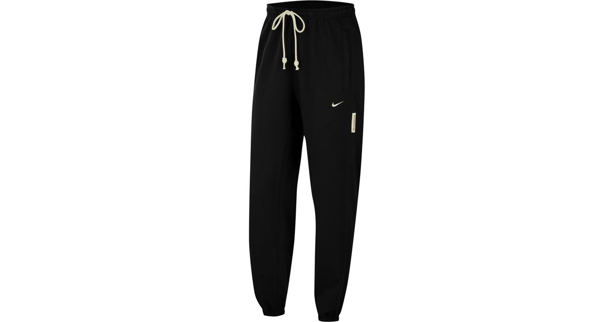 nike men's standard issue pants