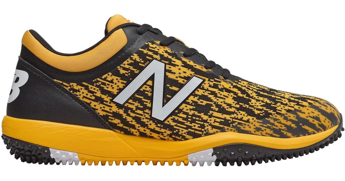 new balance black and yellow turf shoes