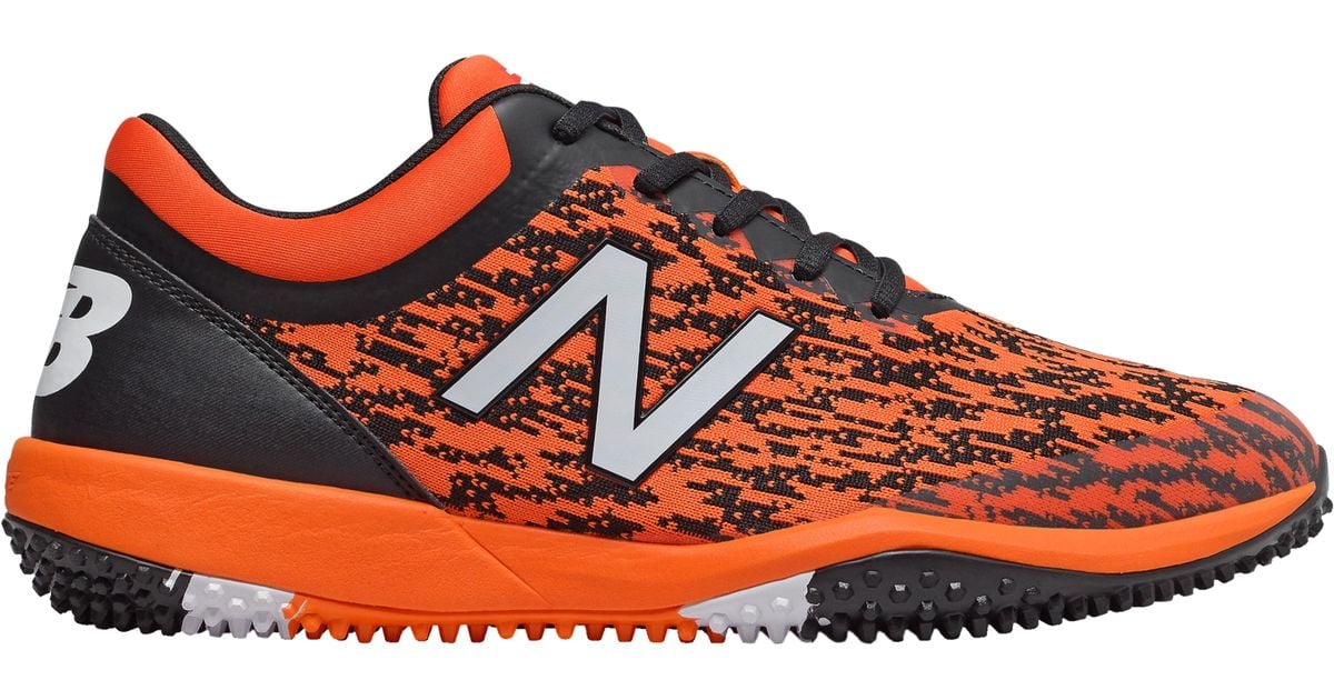 black and orange turf shoes