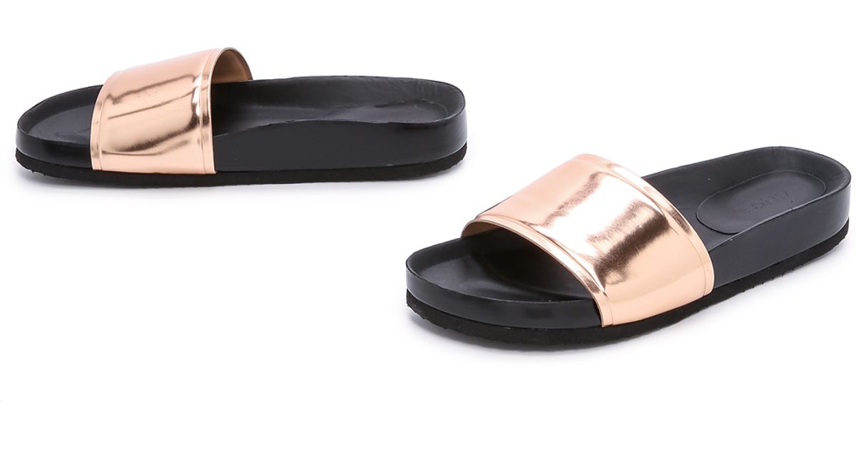 black and rose gold slides