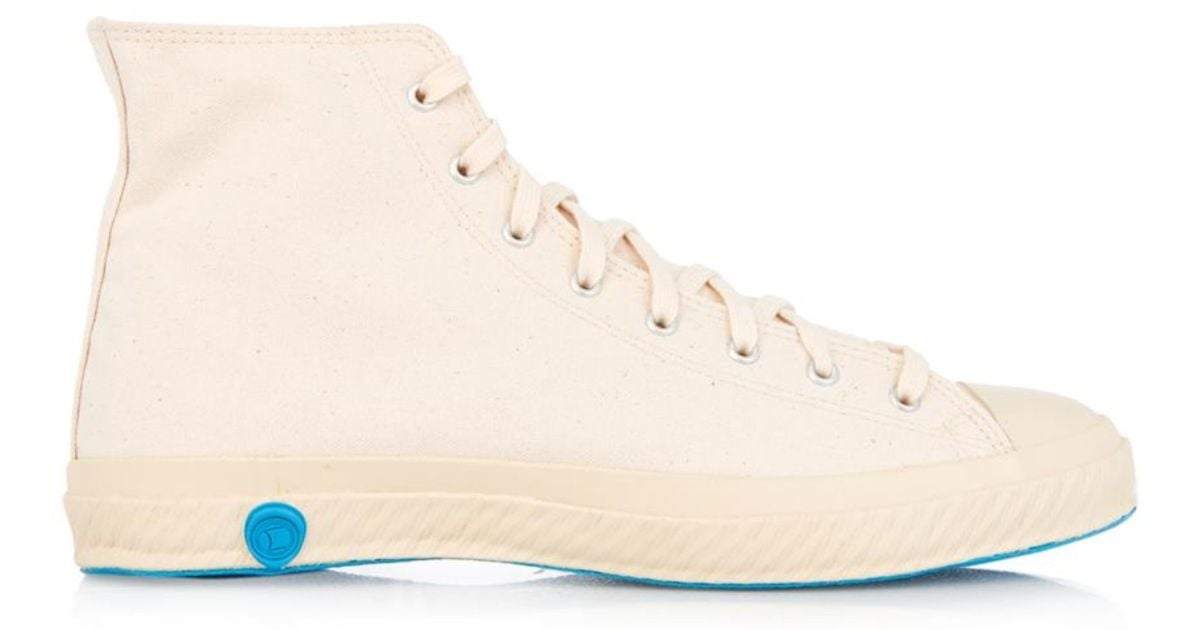 cream high top sneakers