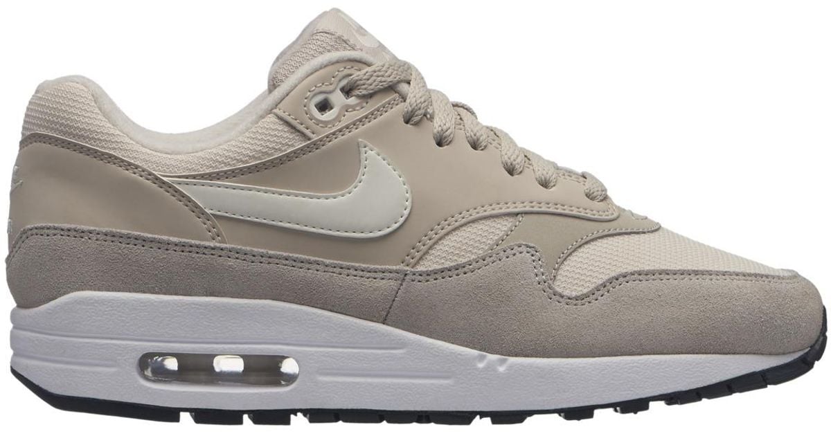 cream nike tech