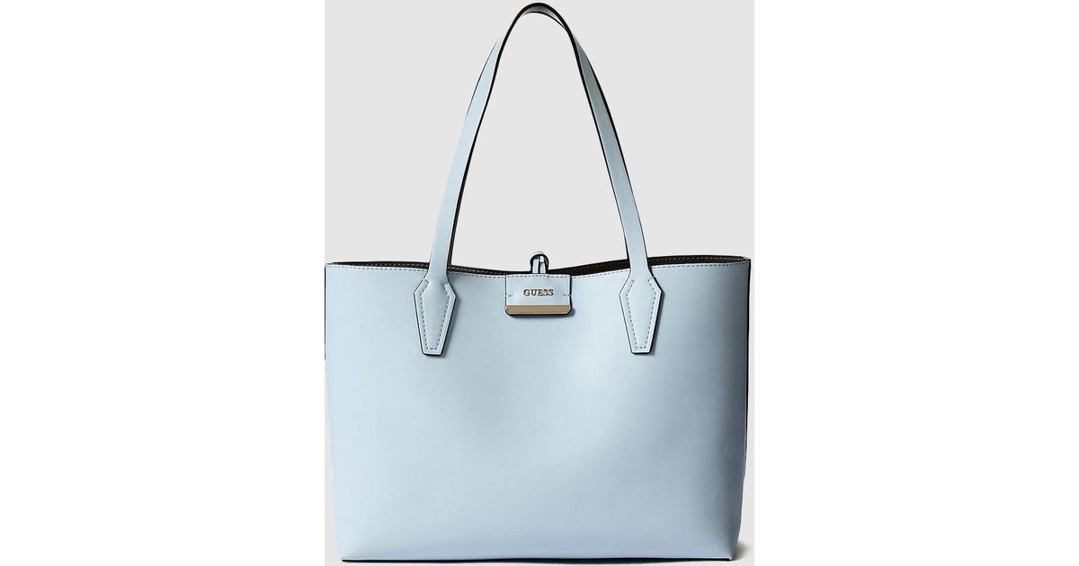 light blue guess purse