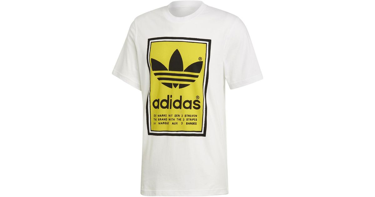 white and yellow adidas shirt