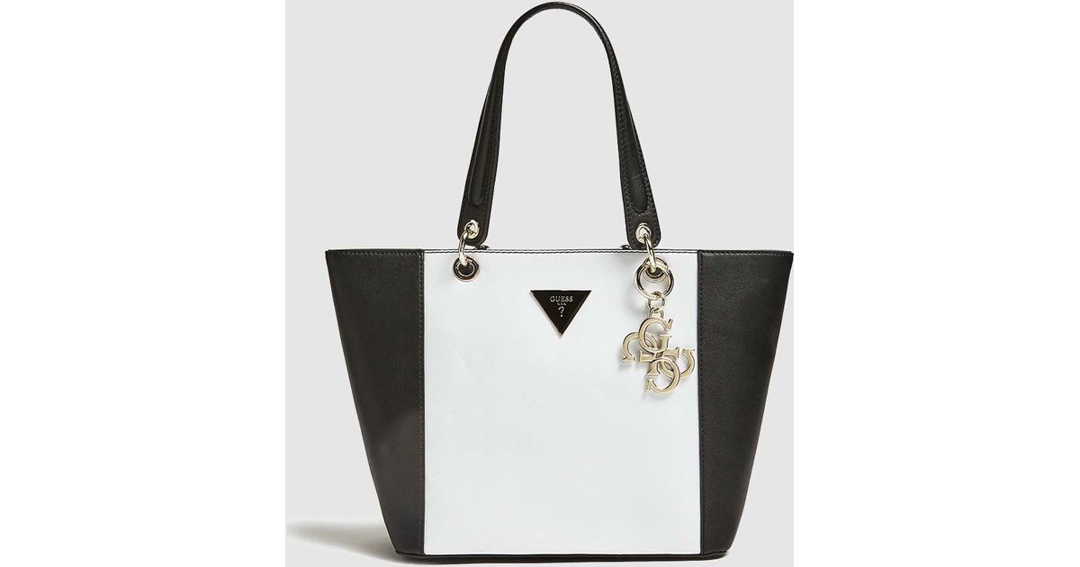 Guess Two-tone Black And White Tote Bag With Metallic Pendant - Lyst