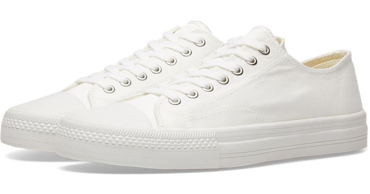 white cotton sneakers