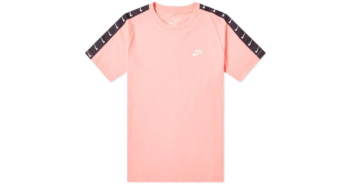 pink and orange nike shirt