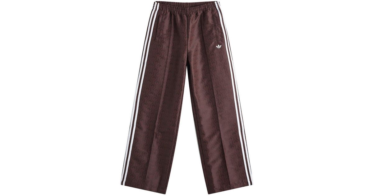パンツ adidas brown wide track pants Adidas Men's Adicolor 70s Wide Leg Track Pant in Brown