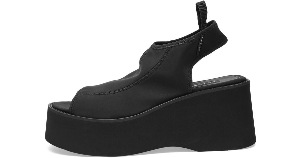 サンダル・ミュール Courreges Black Stretch Polyester Blend Scusa Wave Slippers Courrèges Stretch Polyester Blend Scusa Wave Platform