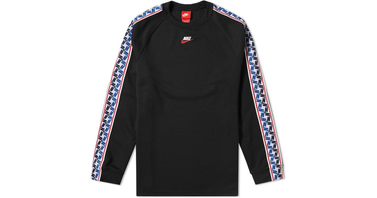 nike long sleeve top with taped side stripe in black