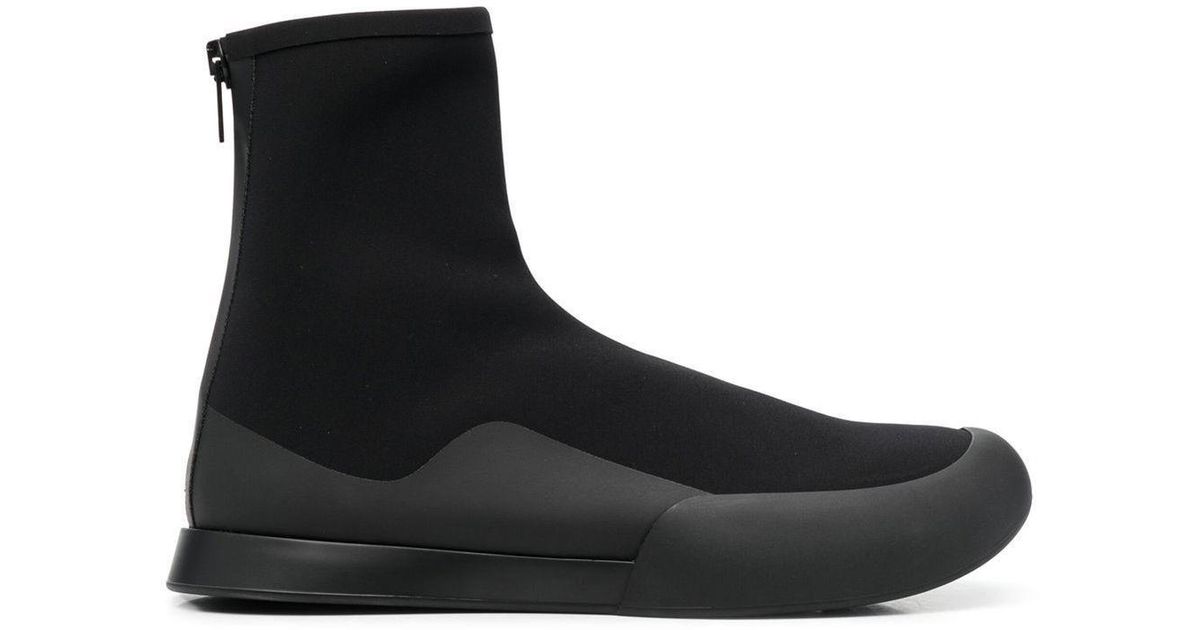 The Row Zipped Sock Boots in Black | Lyst