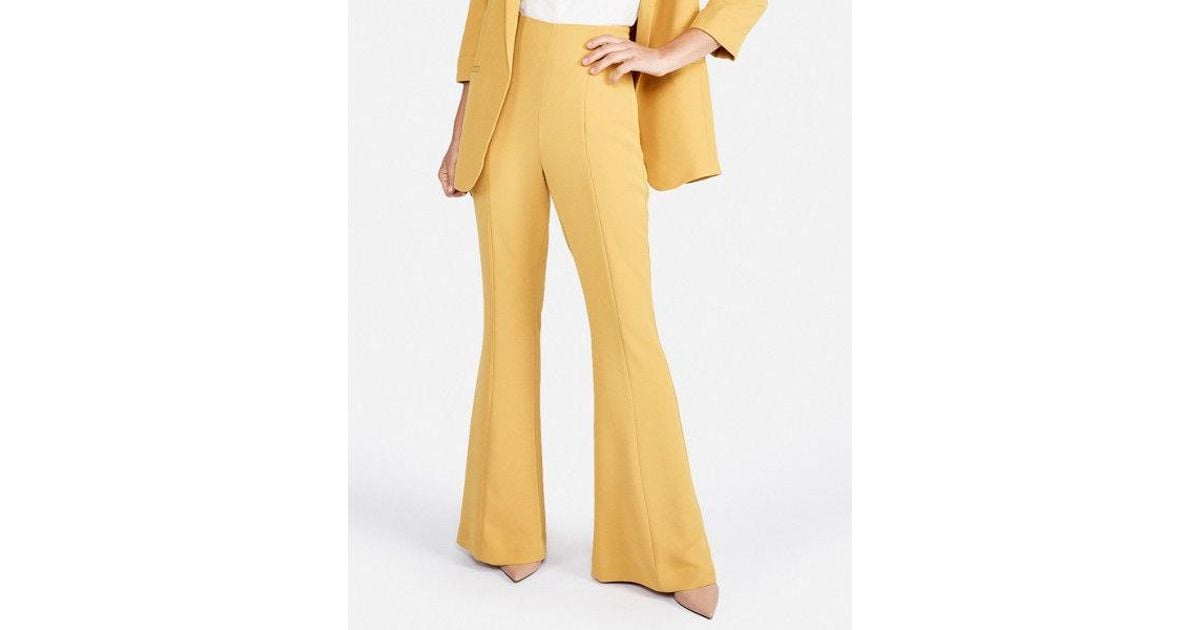 yellow flare trousers