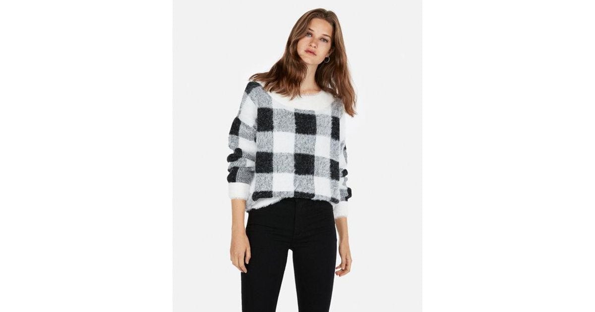 black and white checkered sweater