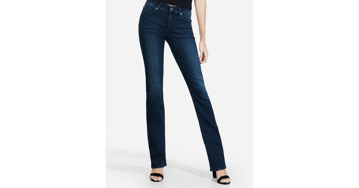 Express Denim Dark Mid Rise Supersoft Barely Boot Jeans in Blue - Lyst