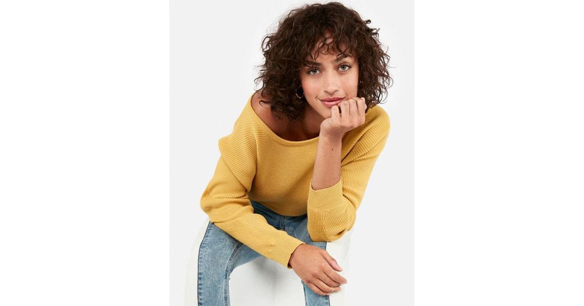 express yellow sweater