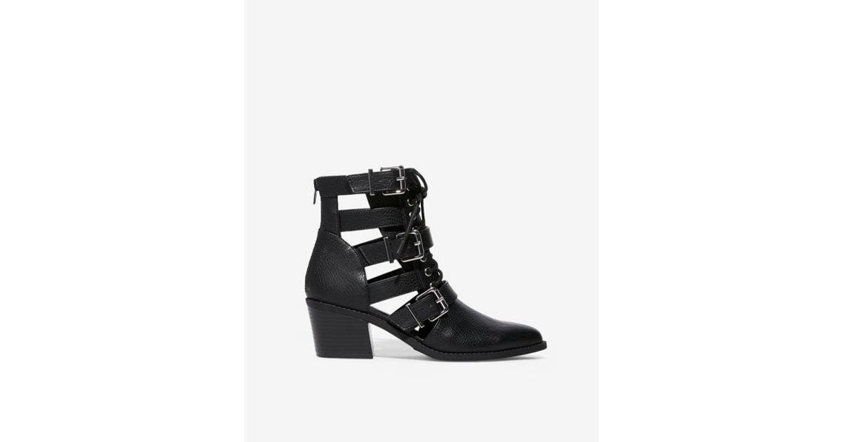 cut out buckle ankle boots