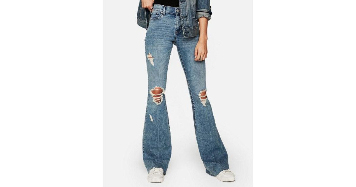 flare jeans ripped
