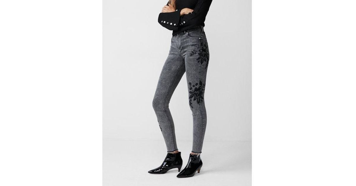 black embroidered jeans
